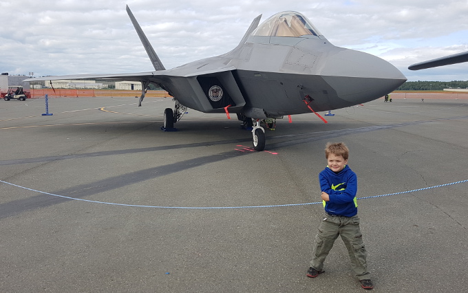 Nathan In Front Of An F-22 Raptor