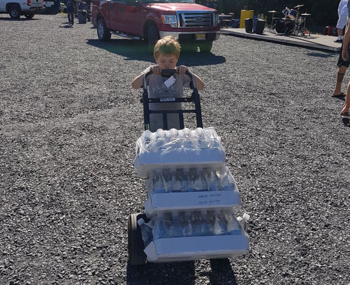 Nathan carrying water