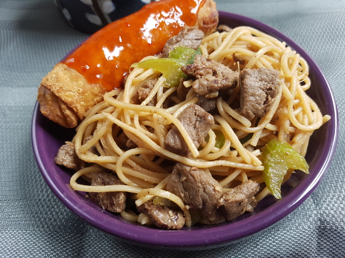 Garlic Teryaki Beef With Lo Mein Noodles and an Egg Roll