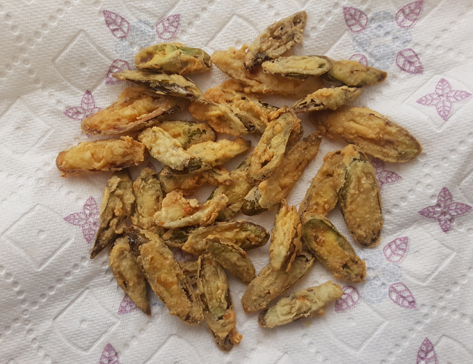 Sliced and fried serrano peppers