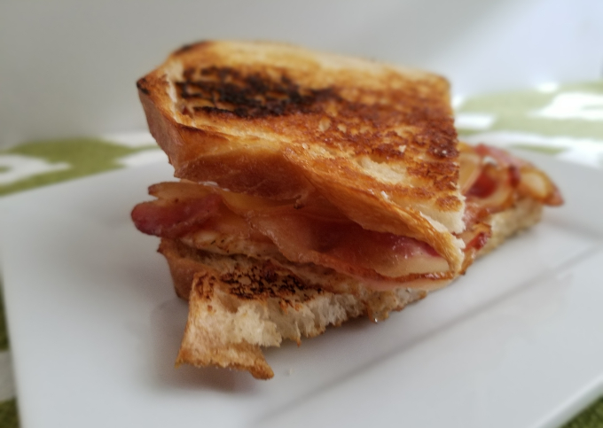 Smokey Gouda and bacon egg sandwich