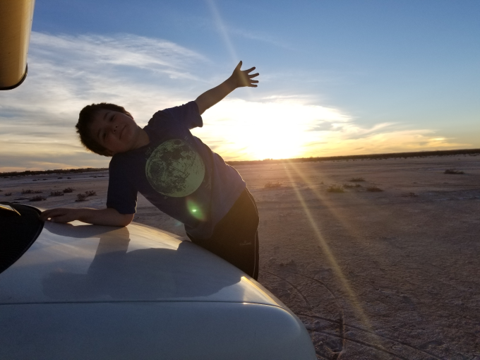 Nathan in front of a sunset in Roswell New Mexico